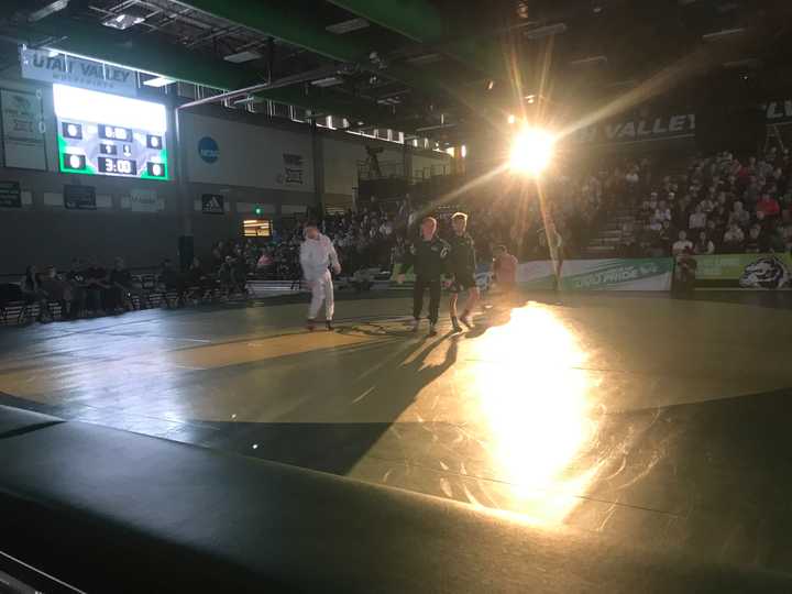 Wisconsin at Utah Valley Wrestling Captains Shaking Hands